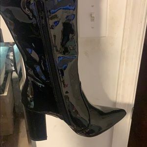 Black leather knee high point toe boots